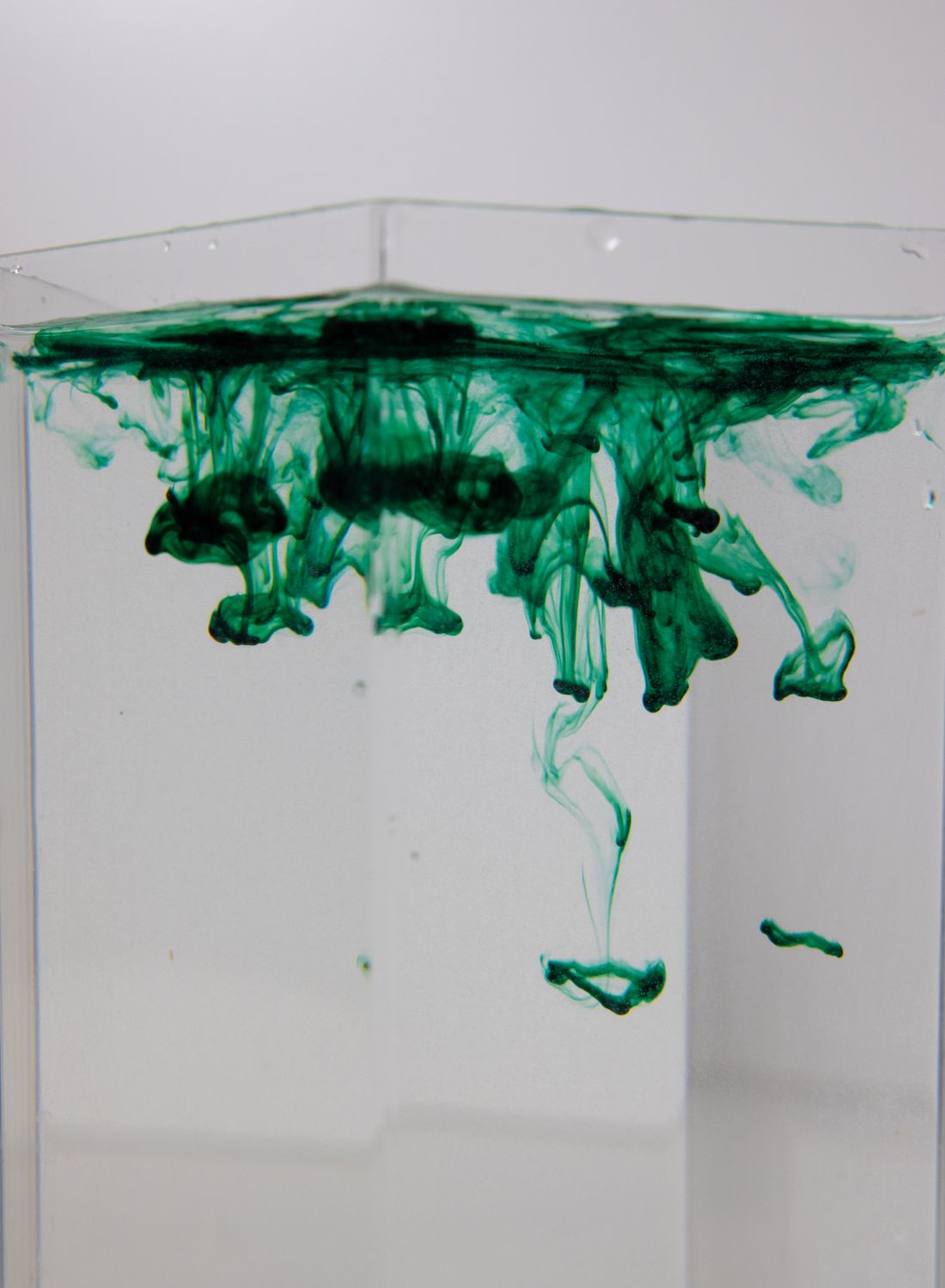 Green dye clouding clear water